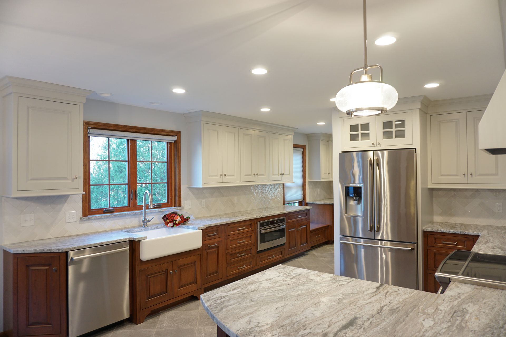 a kitchen with stainless steel appliances and granite counter tops