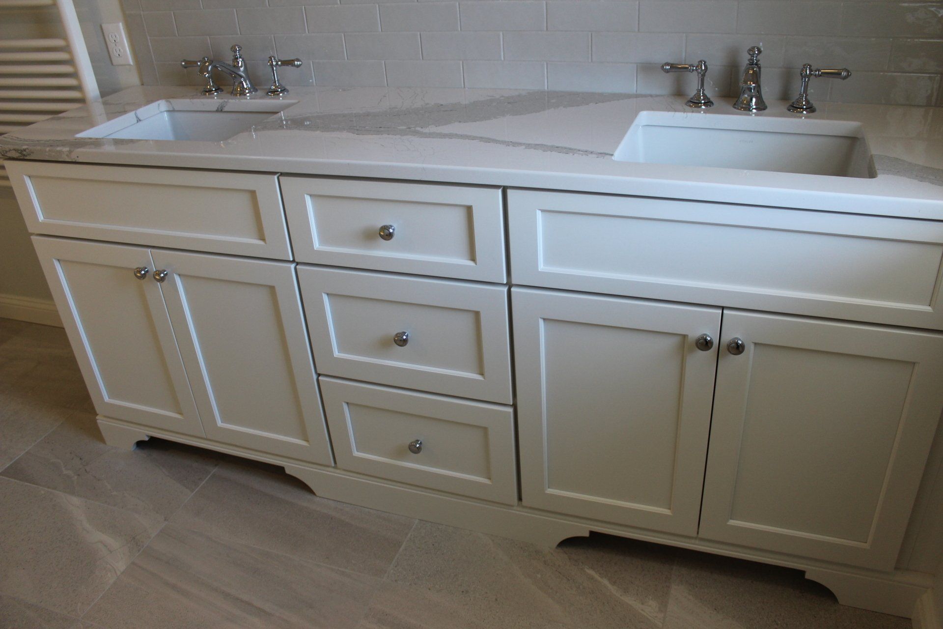 cream color vanity with two sinks on a new bathroom remodeling project in Longmeadow, MA