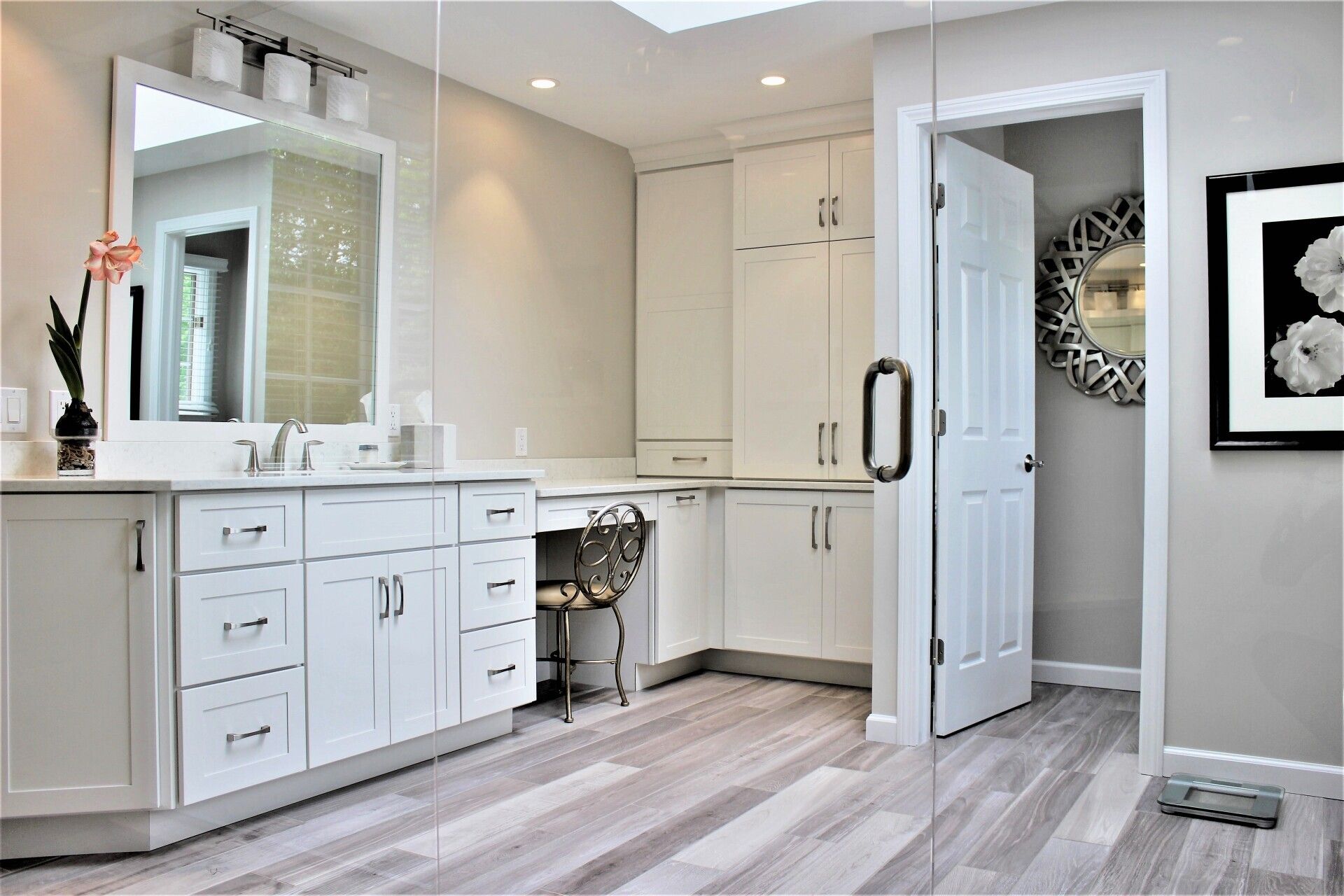 new master bathroom renovation by Joseph Chapelaine & Sons in East Longmeadow. White vanity with large mirror