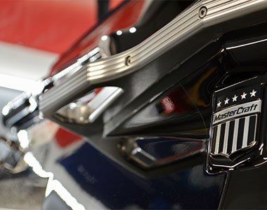 A close up of a master craft logo on a motorcycle