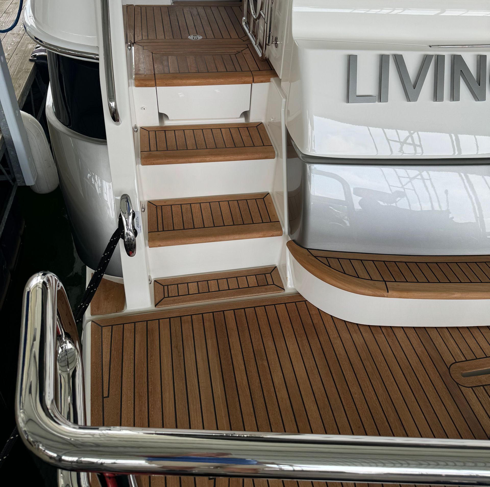 A boat with the word living on the side of it