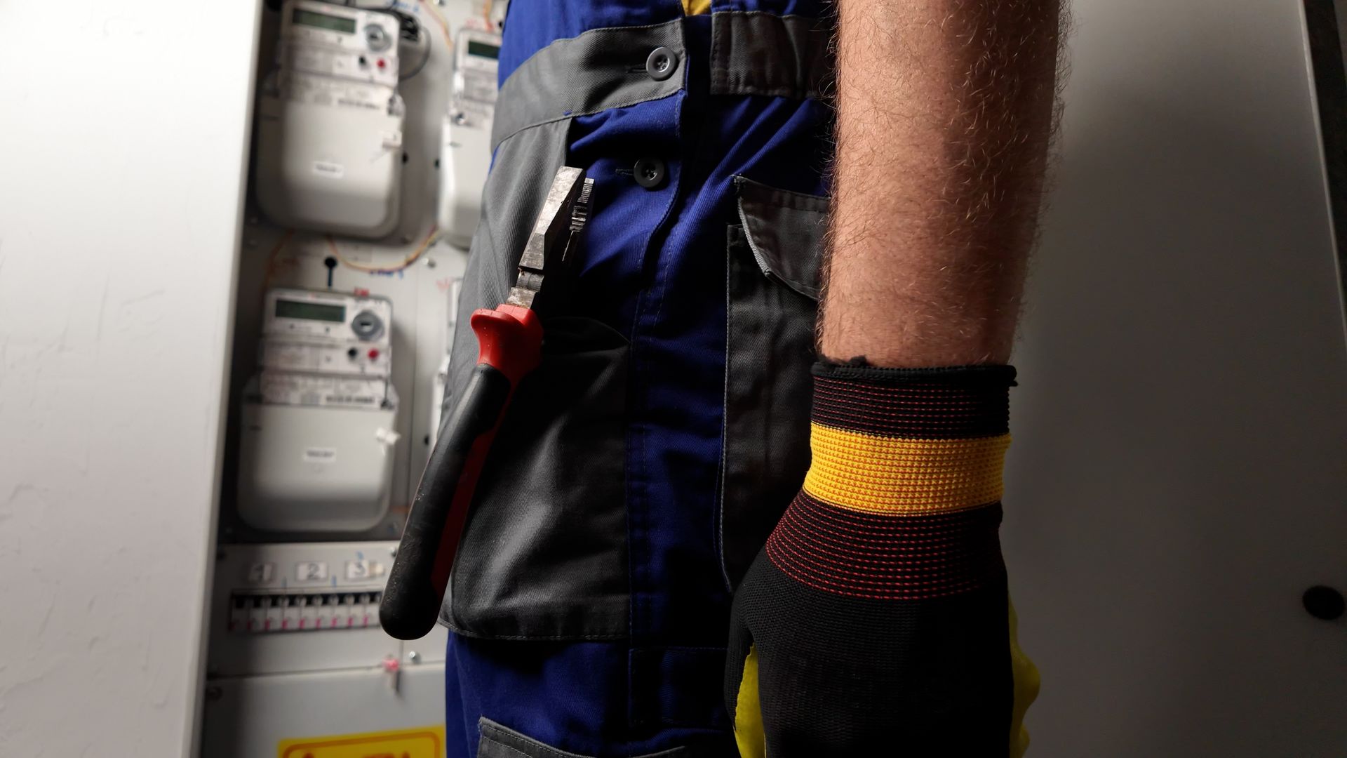 Technician working on a modern electricity power meter - Electrical Metres Supply In Perth