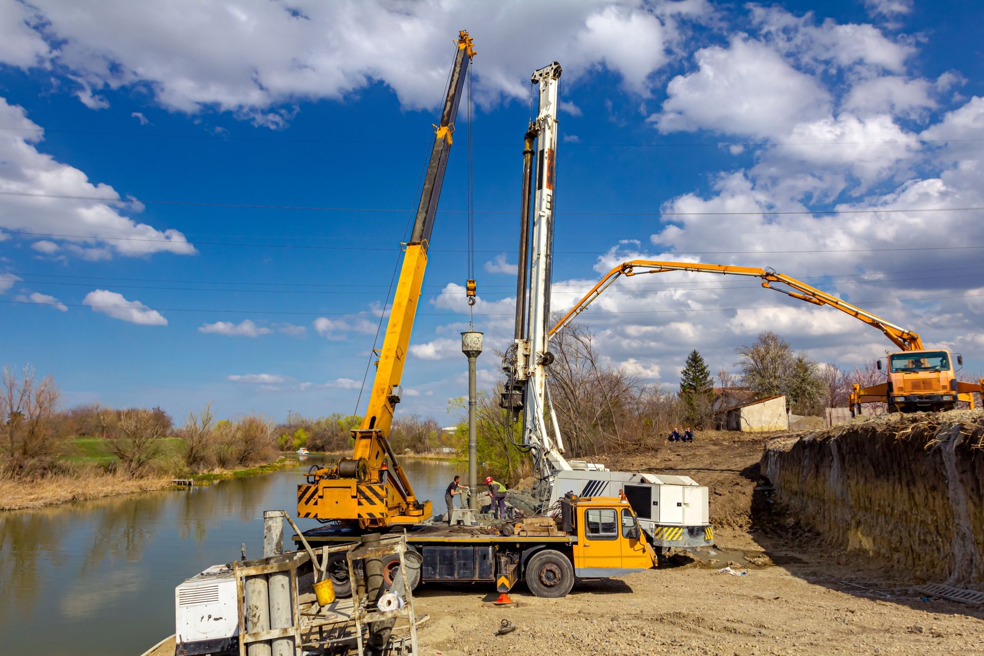 Construction Site: Cranes, Drill, and Concrete Pump — New England & North West Concrete Pumping In Gunnedah, NSW