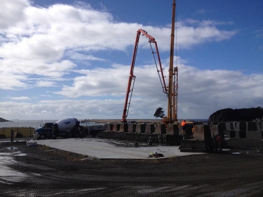 A Concrete Pump Is Being Used To Pour Concrete — New England & North West Concrete Pumping In Uralla, NSW