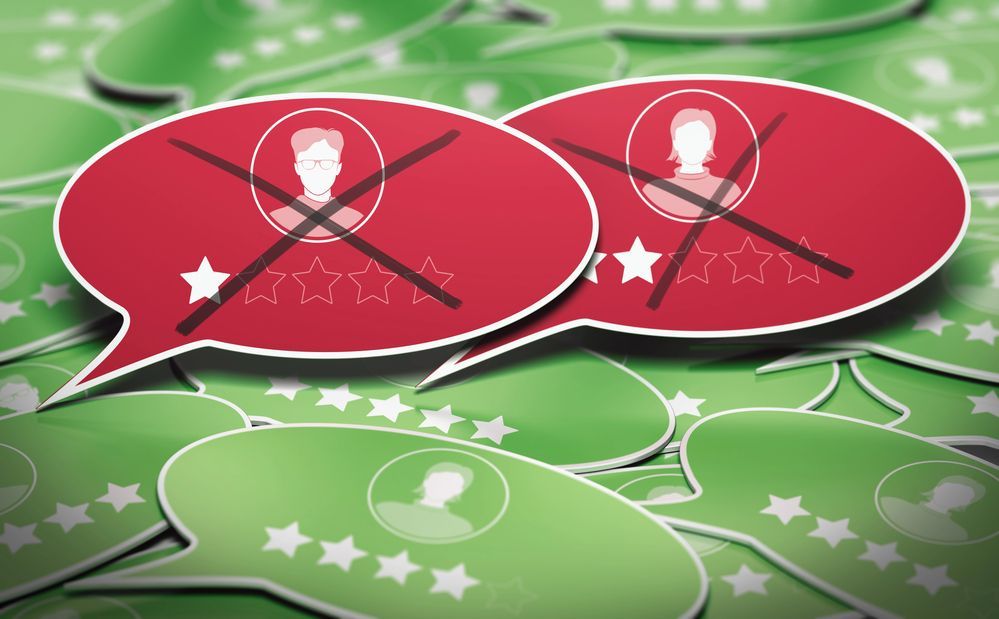 Red speech bubbles with crossed-out avatars and star ratings, sitting on a background of green speech bubbles.