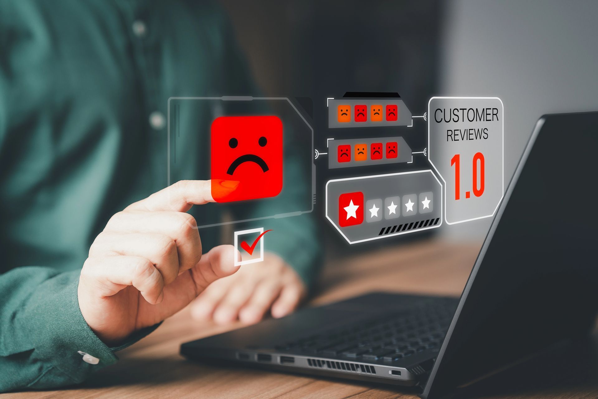 Hand points to a sad review icon beside a laptop and customer reviews rating panel