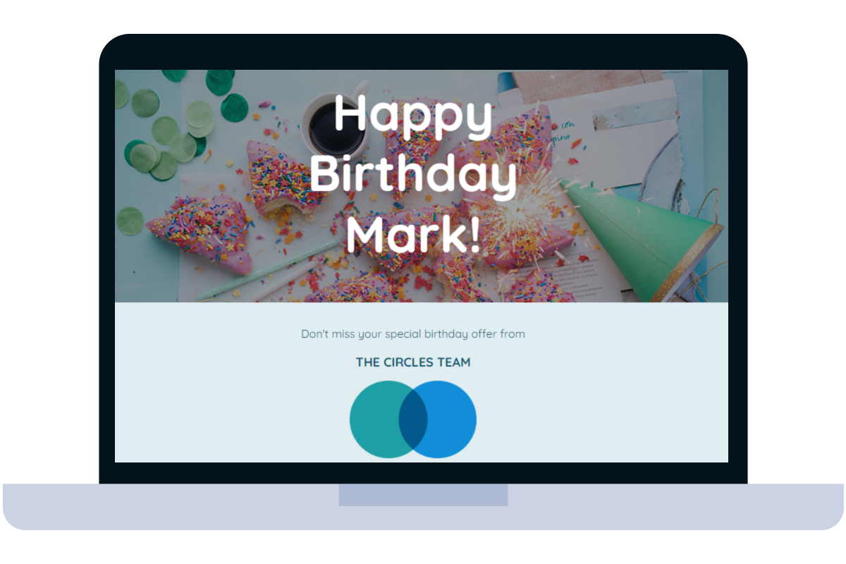 A laptop computer is open to a page that says `` happy birthday mark ''.