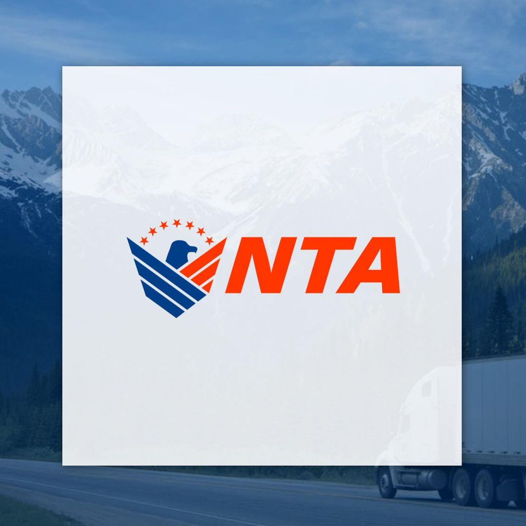 A santa logo with a truck in the background