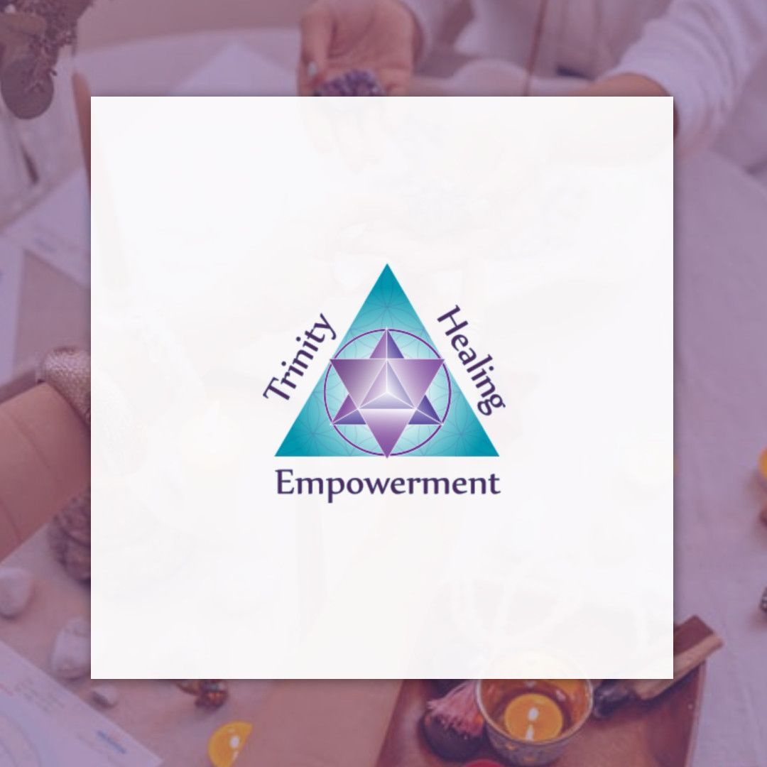 A triangle with the words trinity healing and empowerment on it