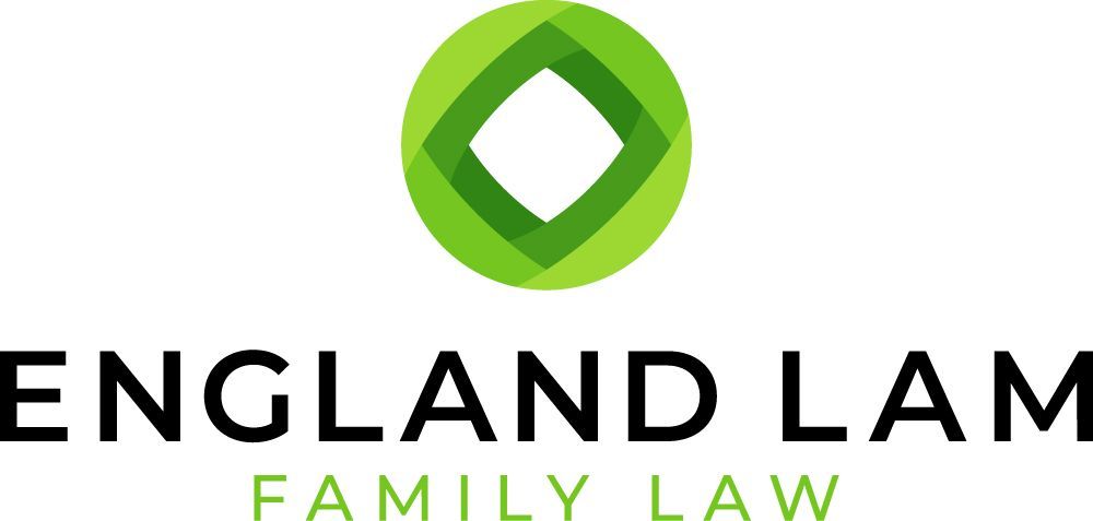 The logo for england lam family law is a green circle with a diamond in the middle.