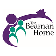 The beaman home logo is purple and green with a house in the background.