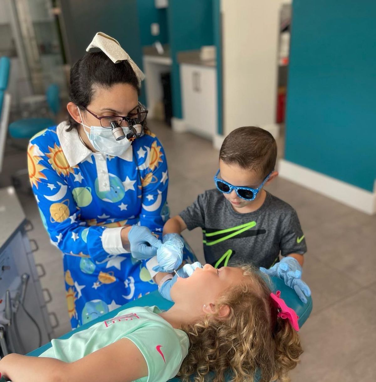 Dentist Examining a Child in a Clinic at Robert A. Lantzy, DMD, LCC  in Newtown, PA