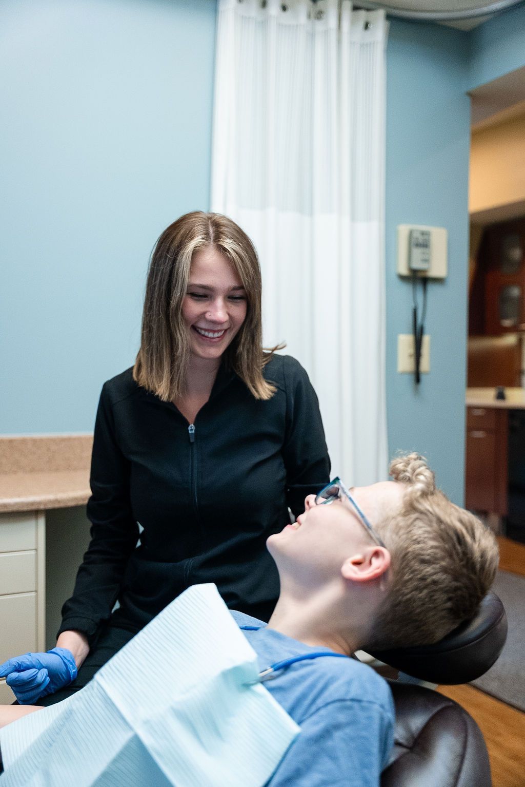 Dentist caring for a young patient at Robert A. Lantzy DMD, Children's Dentistry in Newtown, PA