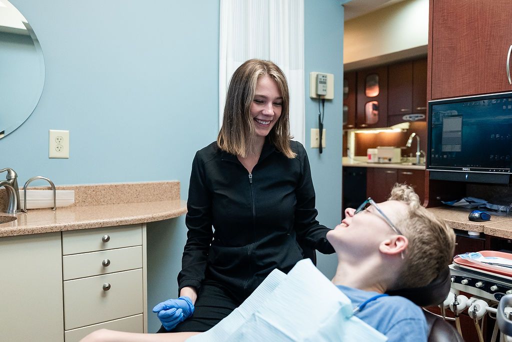 Dentist consulting with a young patient at Robert A. Lantzy DMD, Guided Growth for Kids in Newtown, PA
