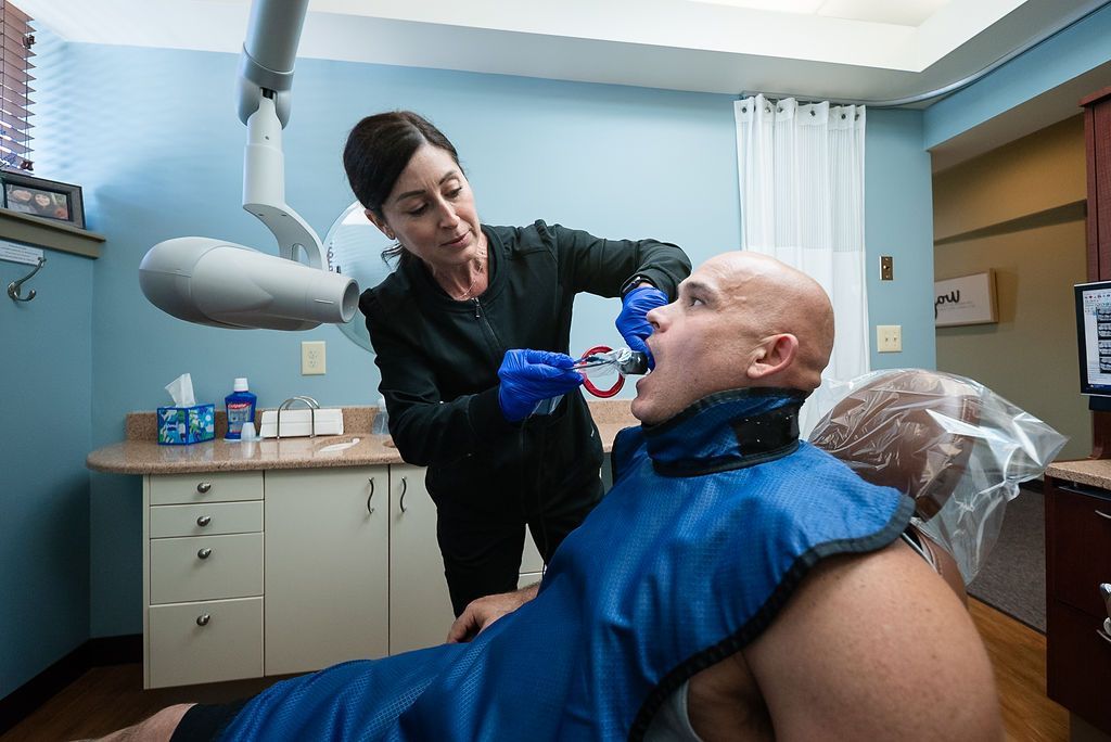 Patient receiving periodontal treatment at Robert A. Lantzy DMD, Non-Surgical Periodontal Care in Newtown, PA