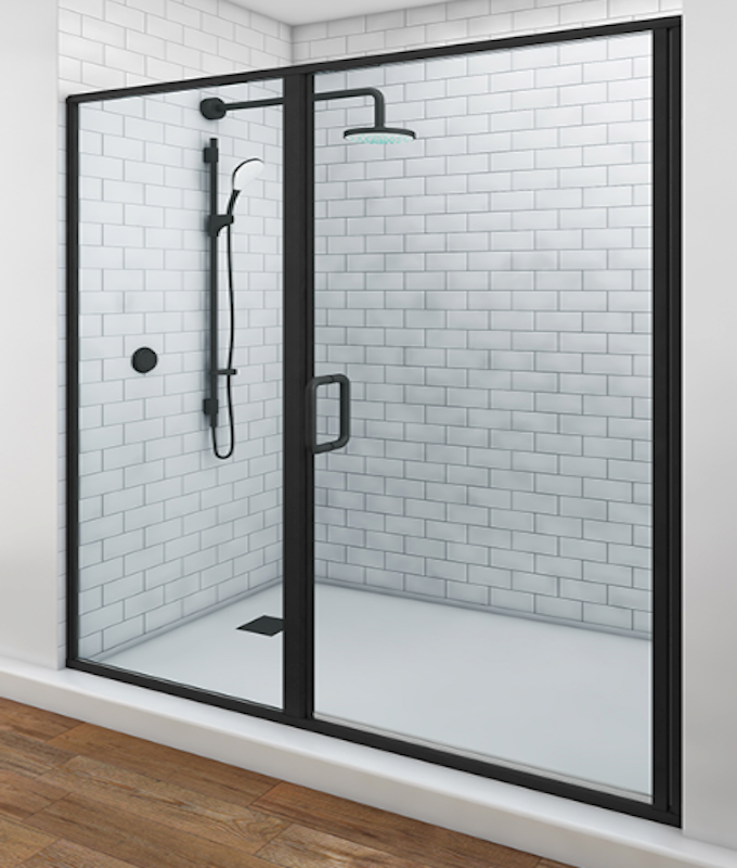 A bathtub with a sliding glass door in a bathroom