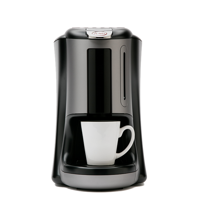 Single-serve coffee maker, dark gray and black, with white mug.