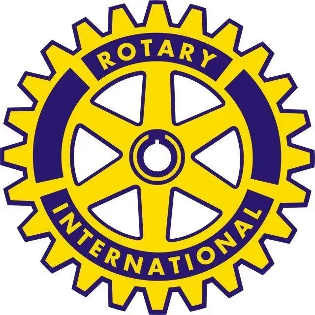 A yellow and blue rotary international logo on a white background