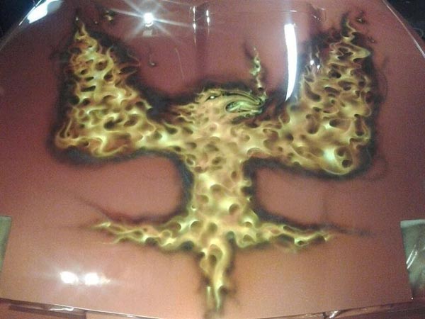 Phoenix tattoo in a car — auto repair Bethel Park, PA