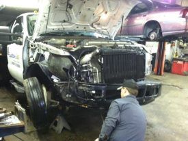 Man repairing a truck — auto repair Bethel Park, PA