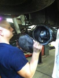 Man repairing a wheel — auto repair Bethel Park, PA