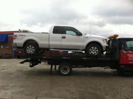 Car being carried by a truck — auto repair Bethel Park, PA