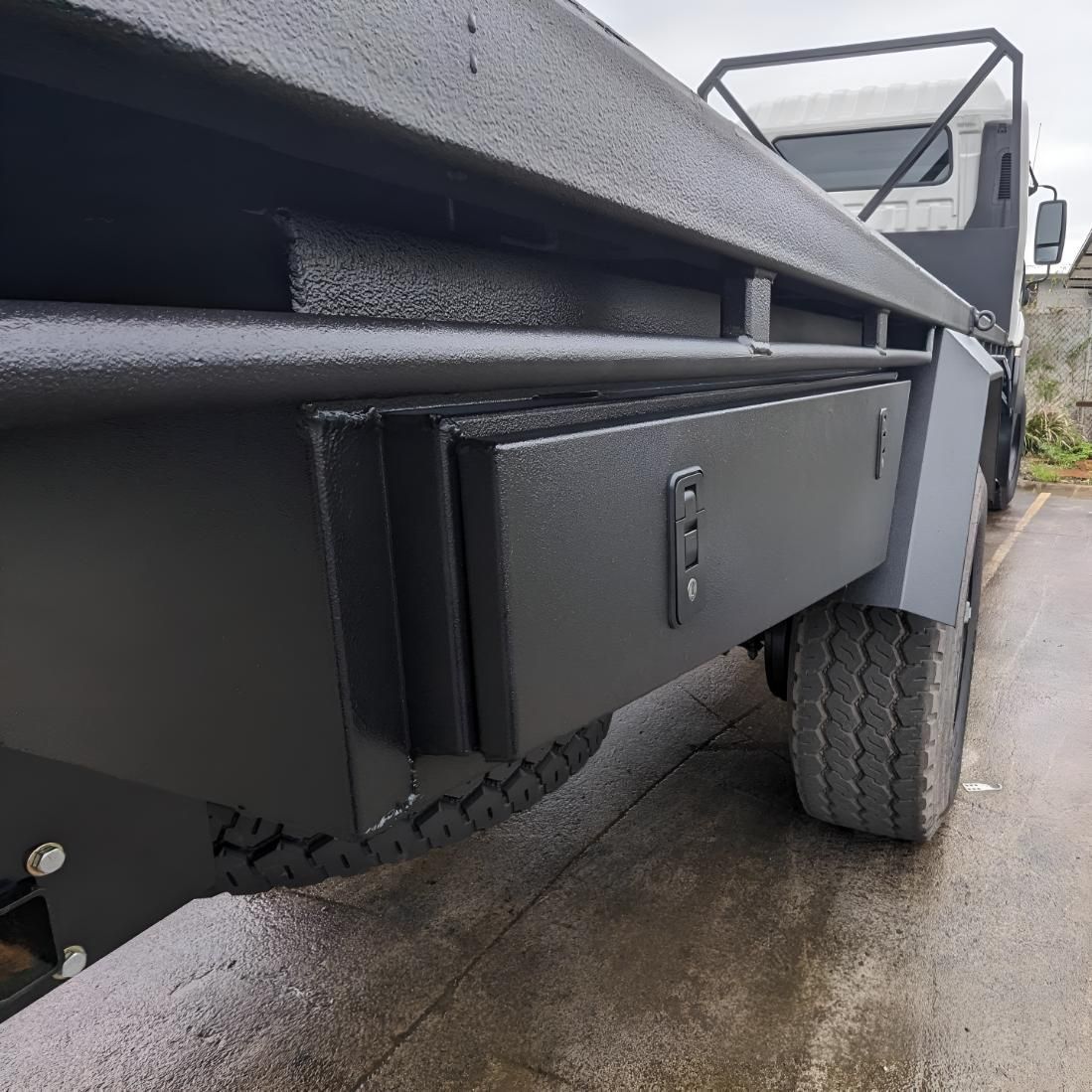 A Black Truck is Parked on the Side of the Road — Turnweld Engineering in Coolum Beach, QLD
