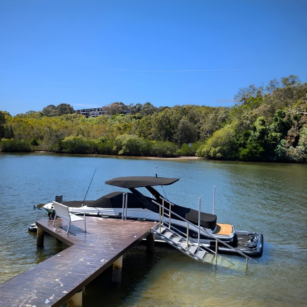 A Boat is Docked at a Dock on a Lake — Turnweld Engineering in Coolum Beach, QLD