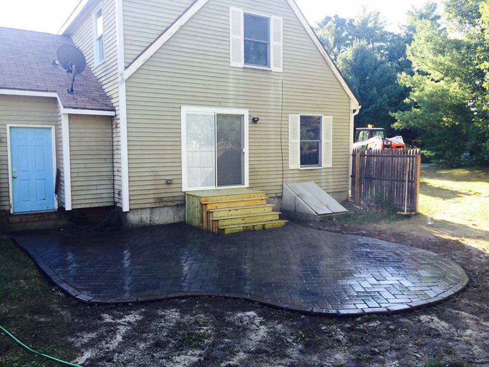 After photo of a rock patio completed in Southern Maine