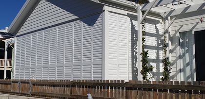 White Shutters With Plants — Shutters in Bundaberg, QLD
