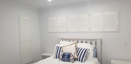 Small Shutters Over The Bed — Shutters in Bundaberg, QLD
