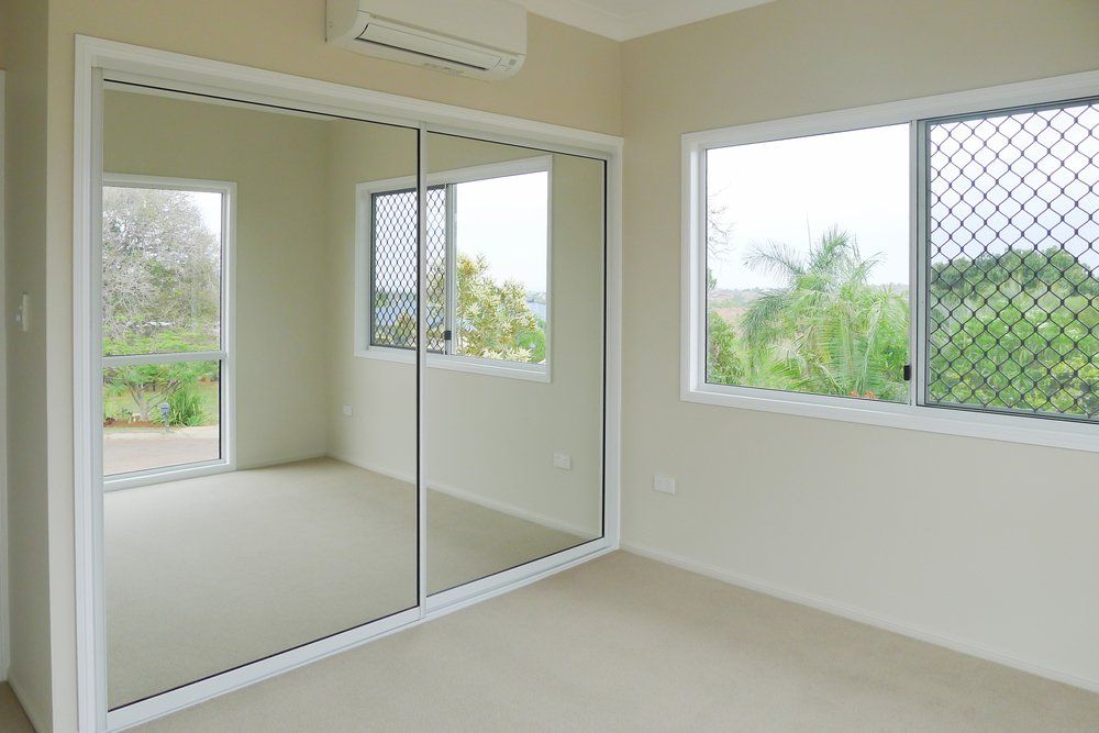 Empty Room & Window with Screen — Window Coverings in Bargar, QLD
