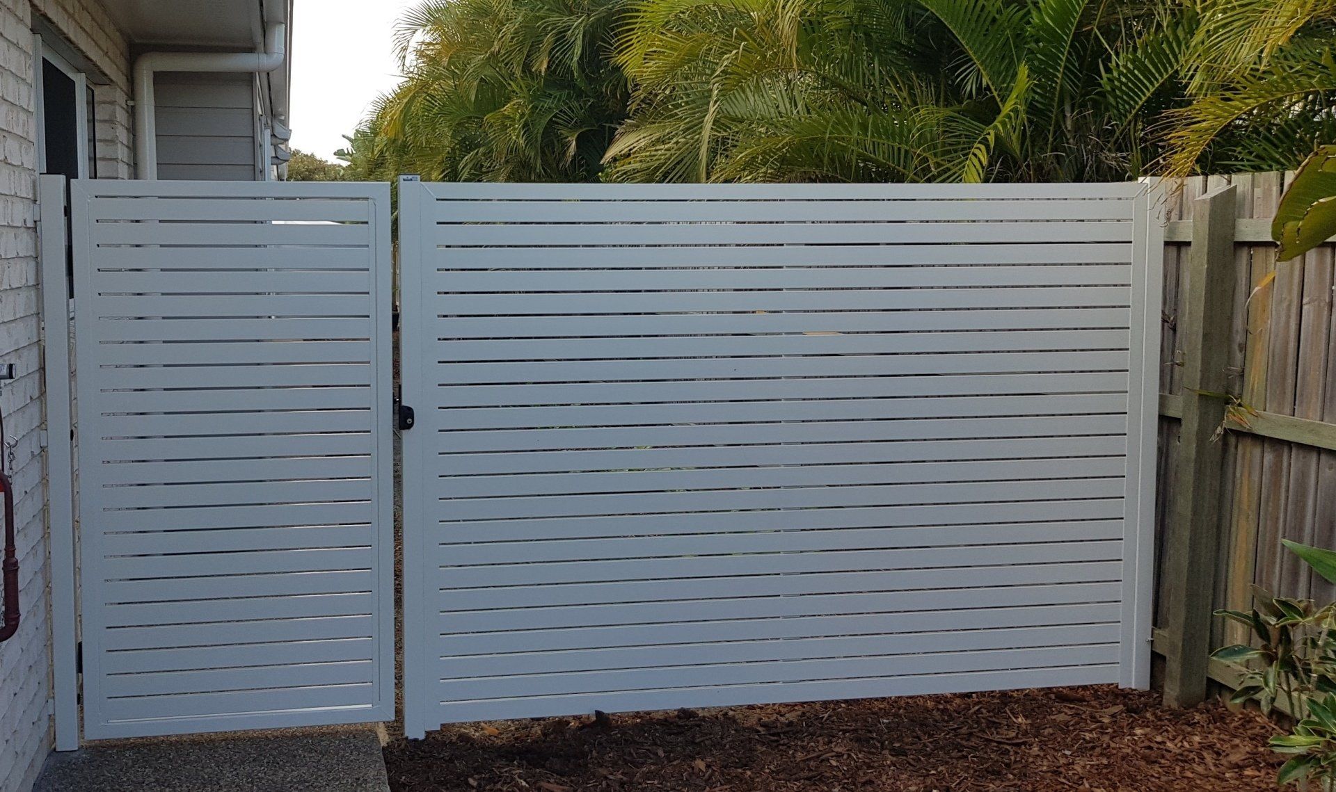 White Aluminum Fence — Aluminium Privacy Screening in Bundaberg, QLD