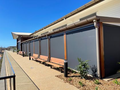 Long Line Of Pull Down Awning — Shutters in Bundaberg, QLD