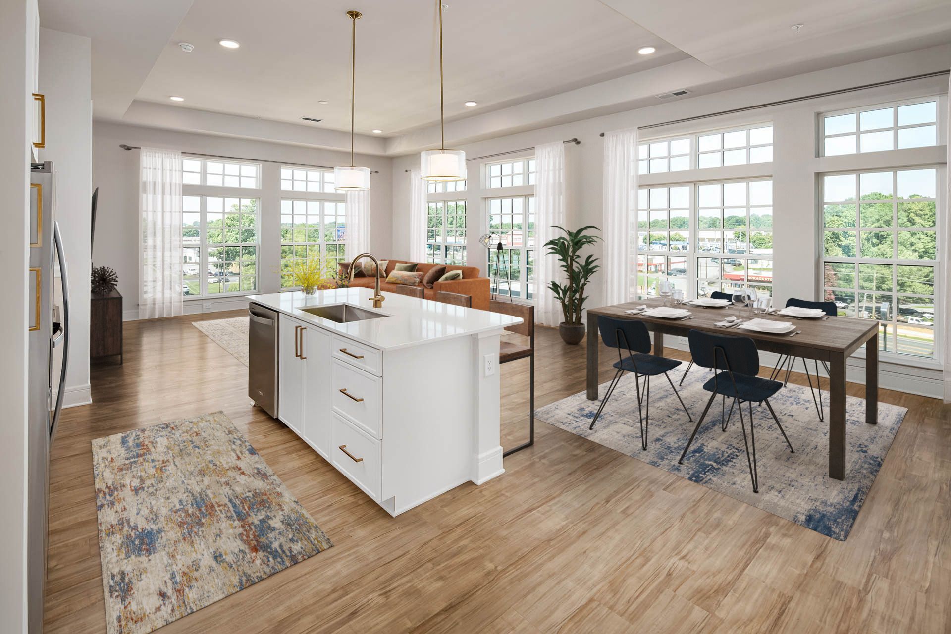 An artist 's impression of a living room and dining room in a house.