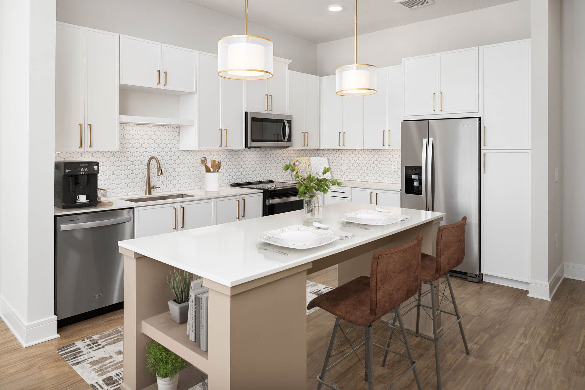 A kitchen with white cabinets , stainless steel appliances , and a large island.