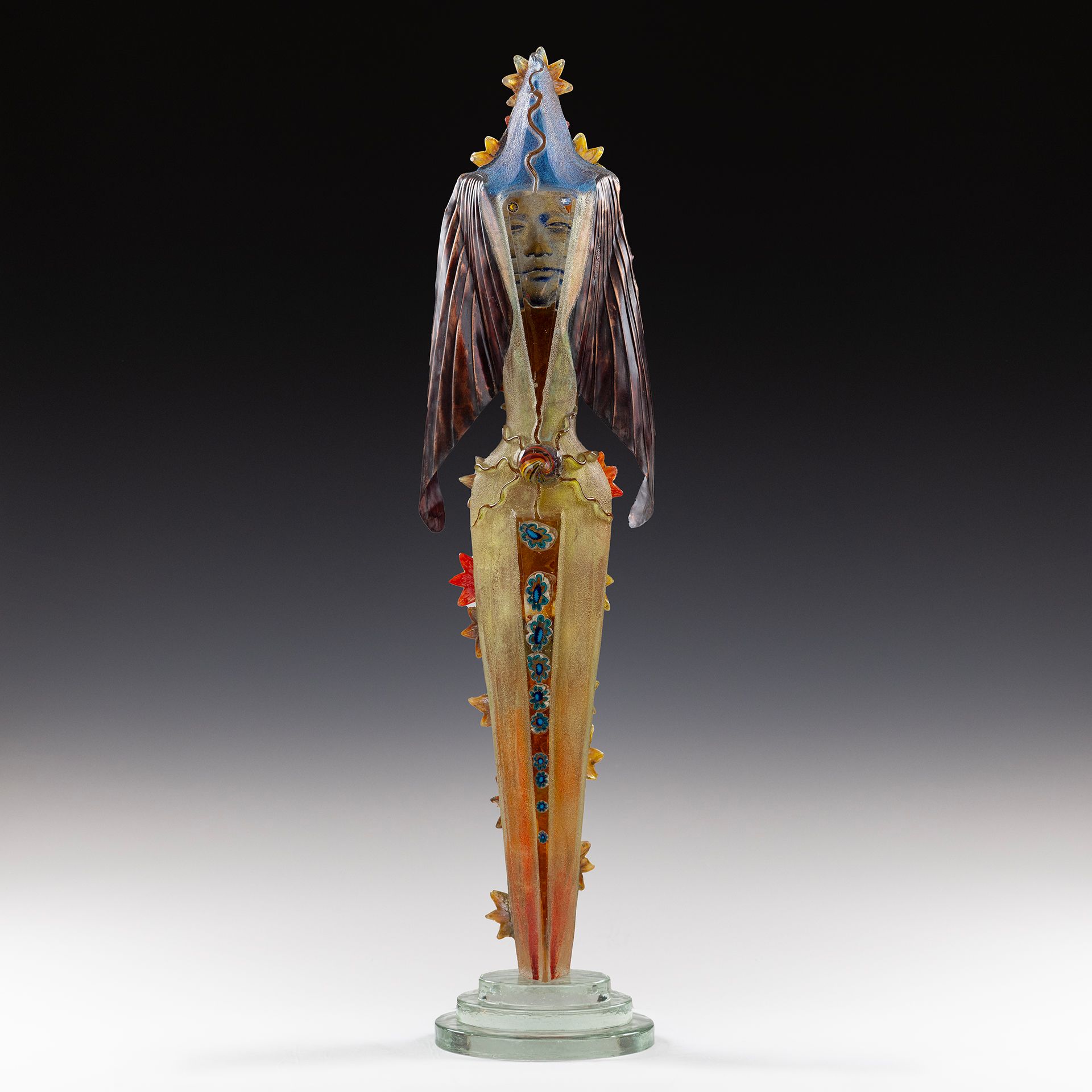 A statue of a woman with wings and a blue hat