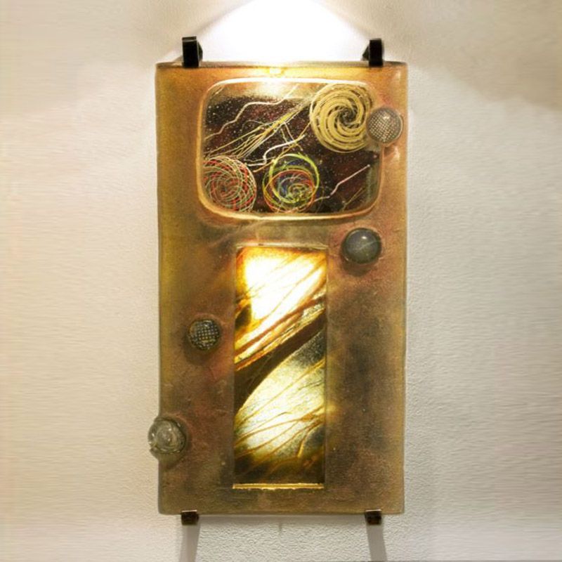 A painting on a wall with a light inside of it