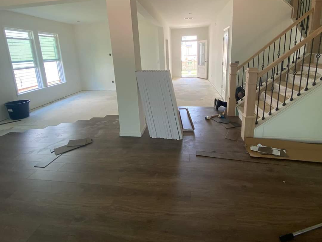 Step by step, getting closer to fully installing this engineered wood flooring.
