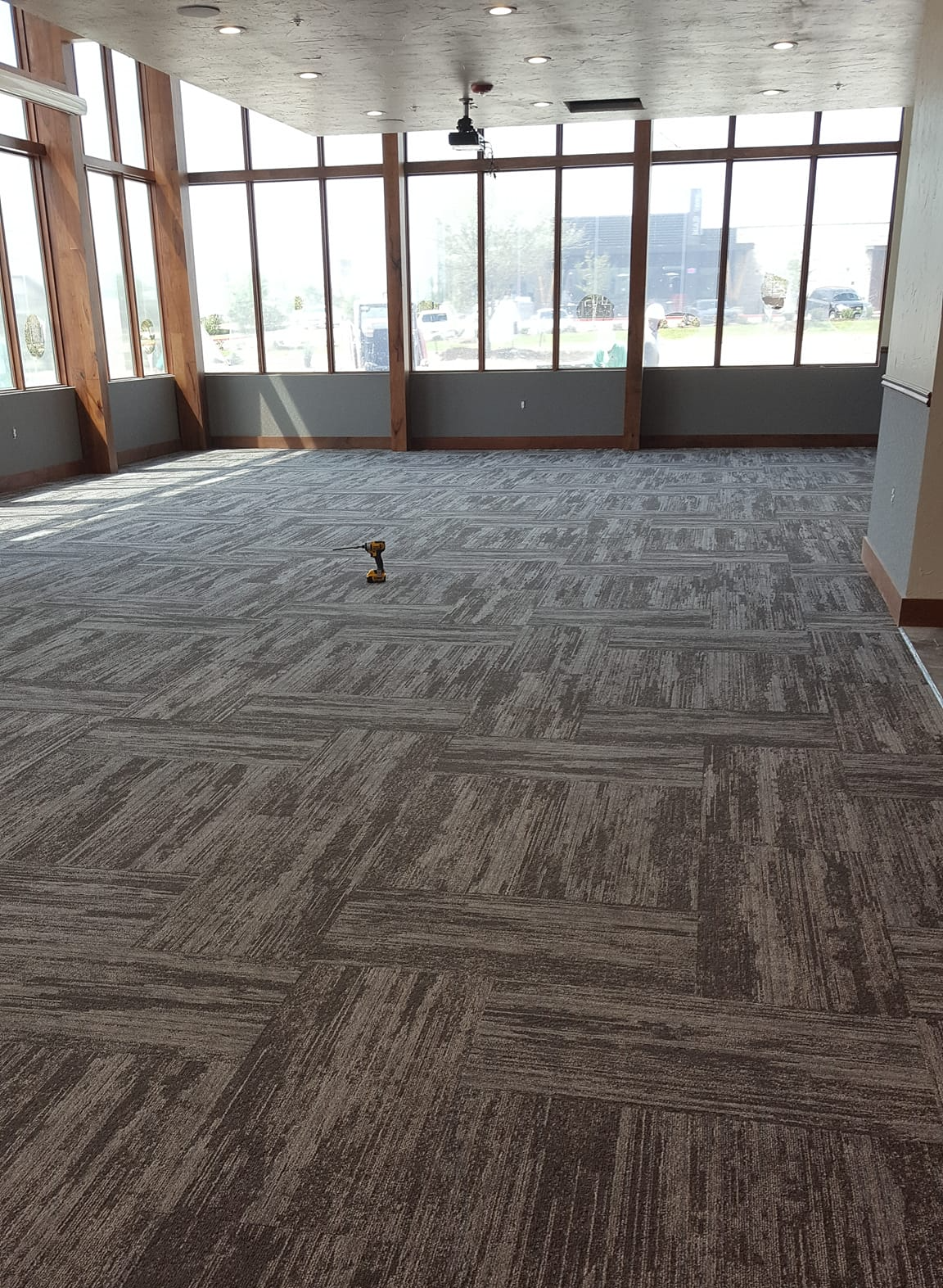 This conference room with it's big windows looks great with this finished carpet installation.