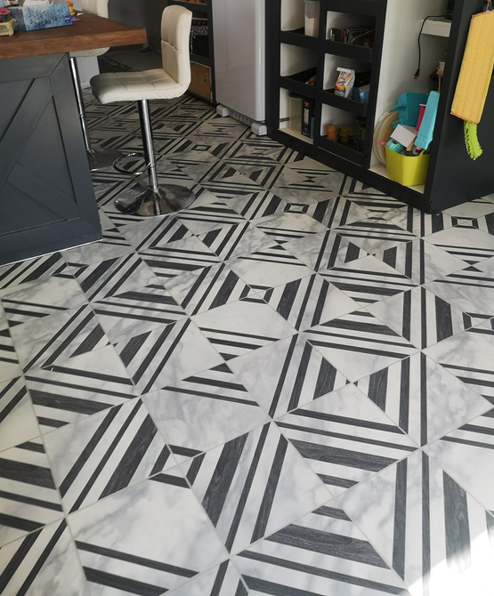 Commercial tile floor installation in a salon.