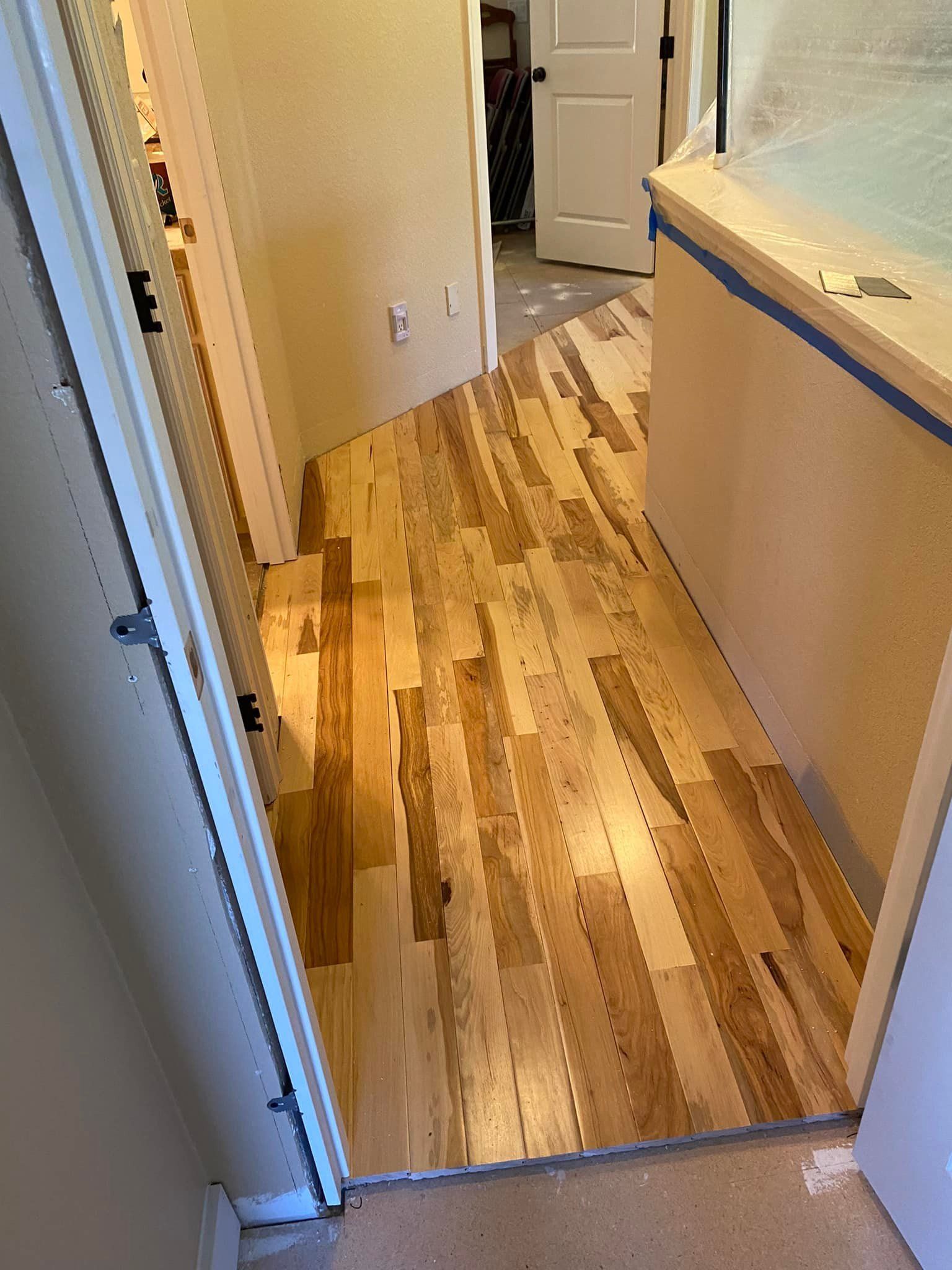 Prefinished hardwood floor looks great in this hallway.