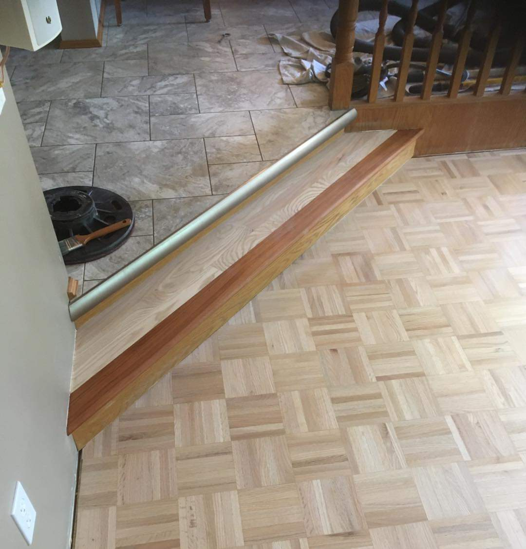 Another shot of this clean transition between tile and hardwood floor.