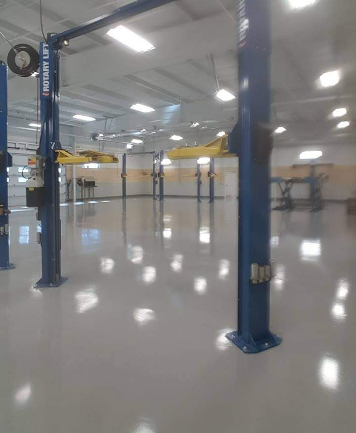 Another shot of these car lifts in a garage we poured epoxy in.