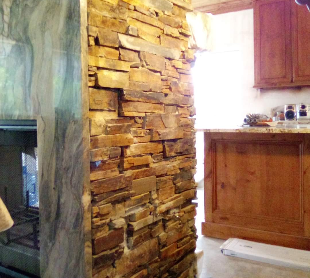 A gorgeous ornamental brick wall has been installed in this ski lodge.