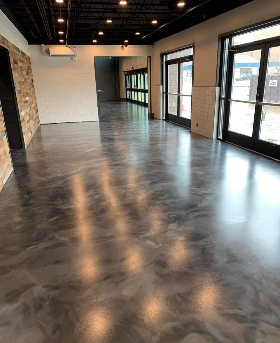 The epoxy flooring in this auto dealership has just the right amount of sheen.