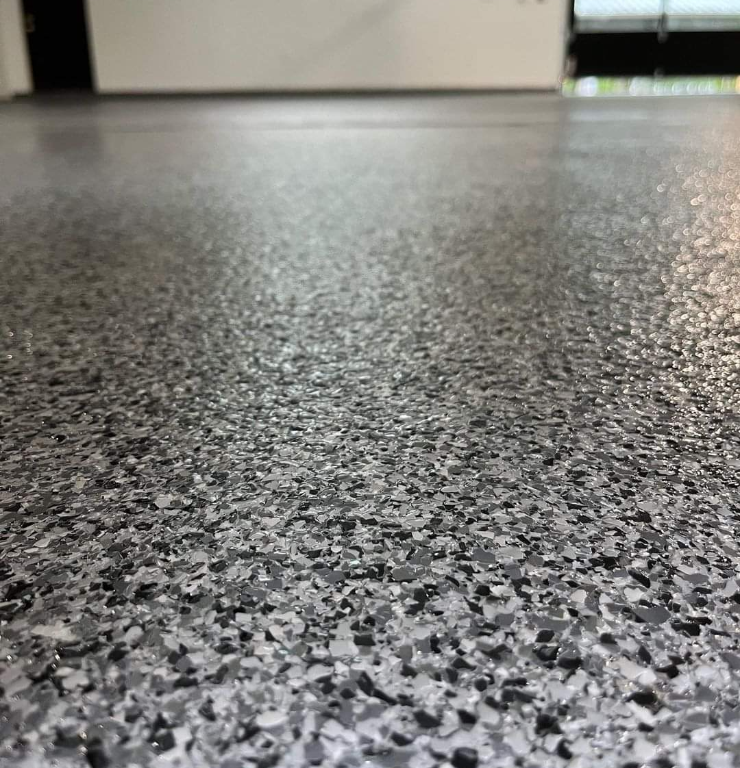 An up close photo of the textured surface of this epoxy floor.