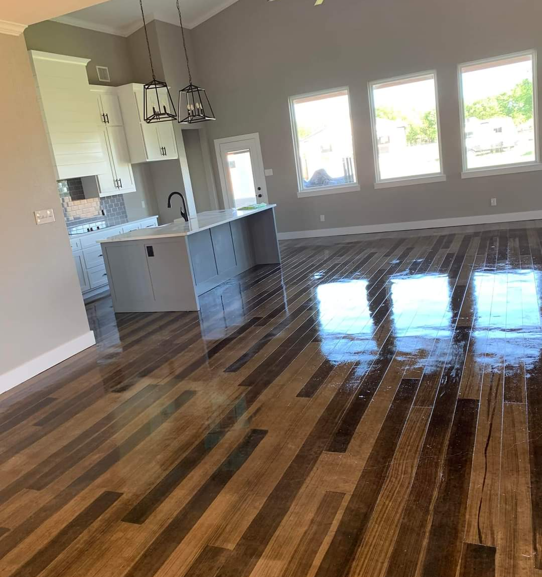 Another shot of faux-wood flooring in this spacious condominium. It looks great and has tons of durability.