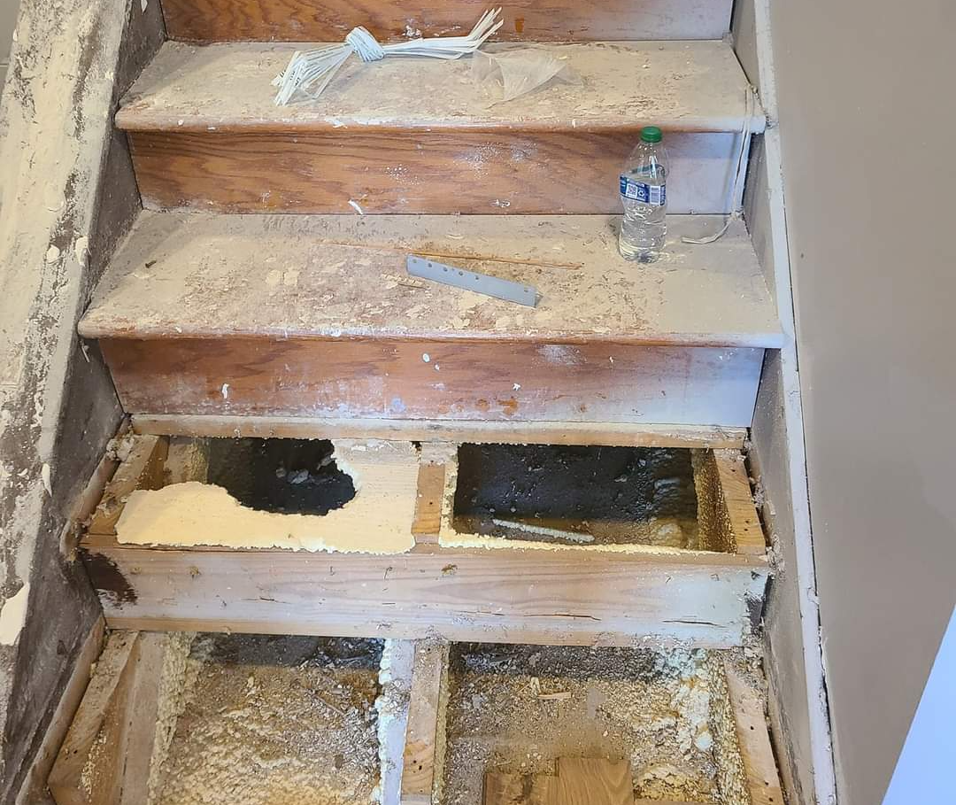 Steps are being torn out as part of this flooring replacement job.