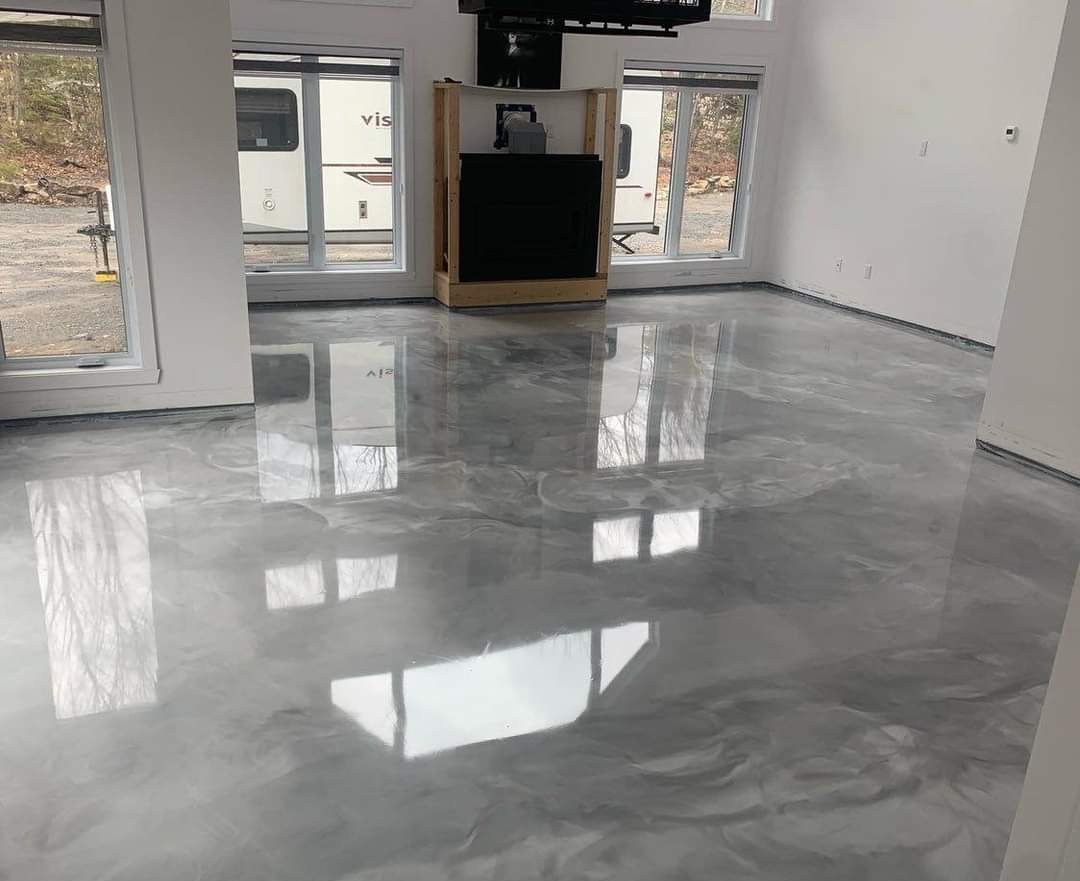 Shiny and beautiful epoxy floors have been poured in this spacious living area.